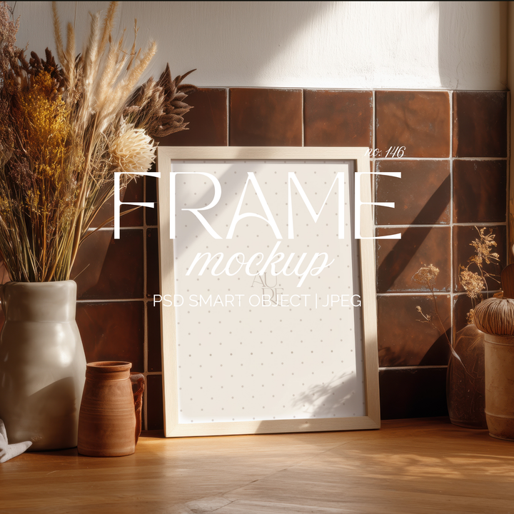 Sunlit rustic frame mockup against brown tile wall with dried botanicals, ceramic vases, and warm natural styling for showcasing artwork.